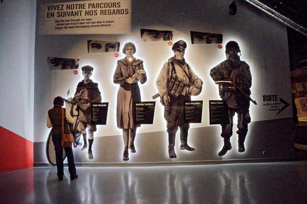 Photograph of the four narrators at the Bastogne War Museum.